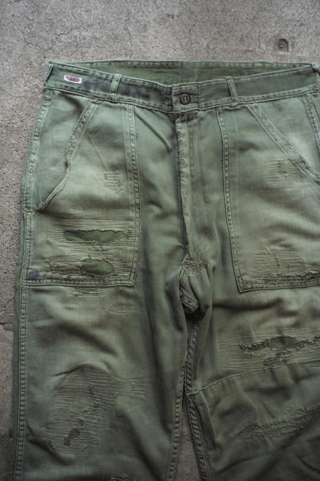 US ARMY BAKER PANTS REPAIRED 03